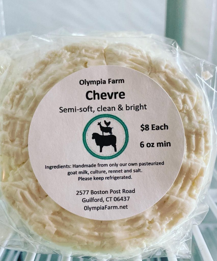 Chevre cheese stored in plastic container