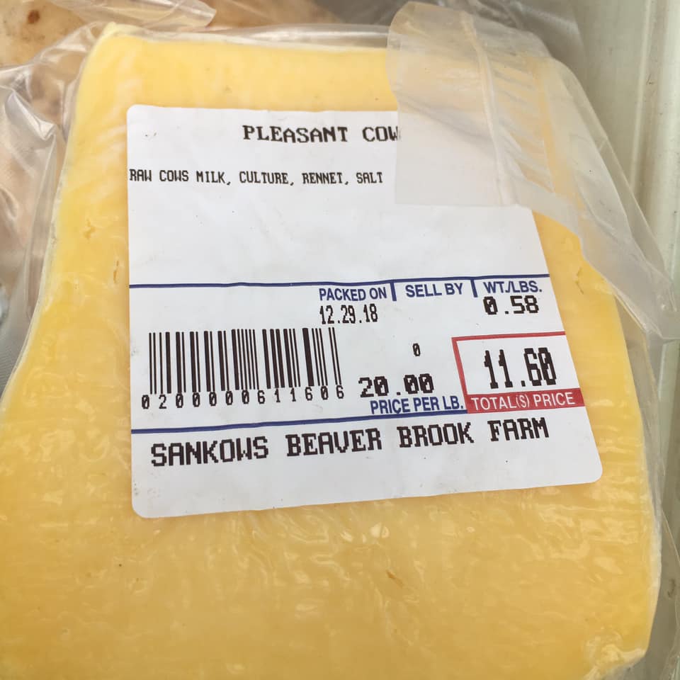 Sample of cheese in container